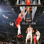 Alex Len dunking for the Washington Wizards (away) against the Cavs