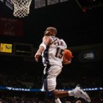 Vince Carter dunking for the New Jersey Nets