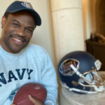 David Robinson with a gridiron and Navy things