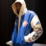 Kevin Durant wearing a top 75 players of all-time jacket