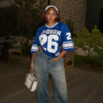 Jordyn Woods wearing a jersey 