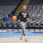 Penny Hardaway dribbling as a Memphis Tigers coach 