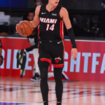 Tyler Herro dribbling in the black Miami Heat jersey