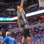 Tyrese Haliburton dunking for the Sacramento Kings 