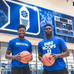 Zion Williamson standing with Duke teammate 